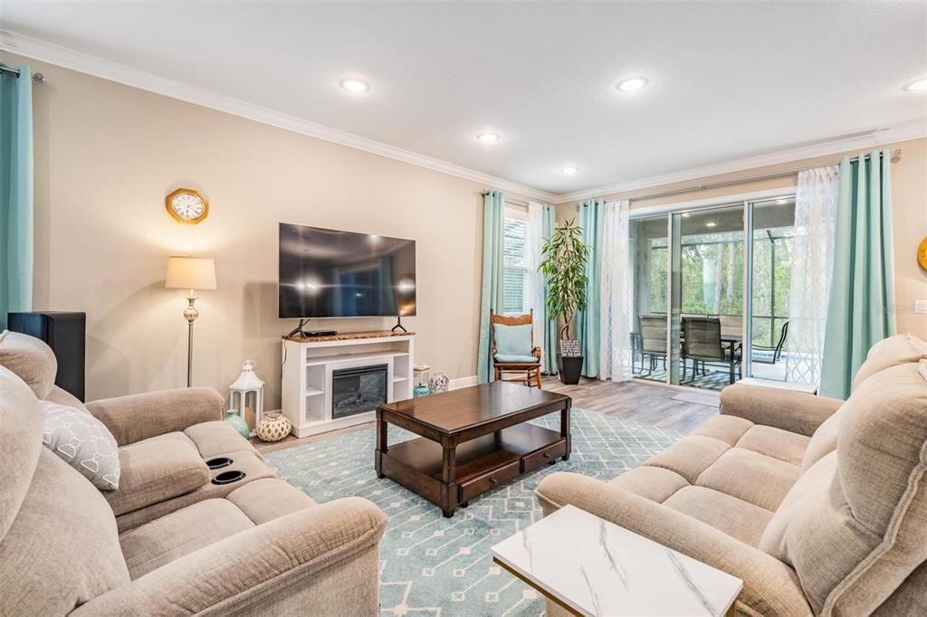 Fireplace, Interior, Living room, Recessed Lighting, Wood Texture Flooring