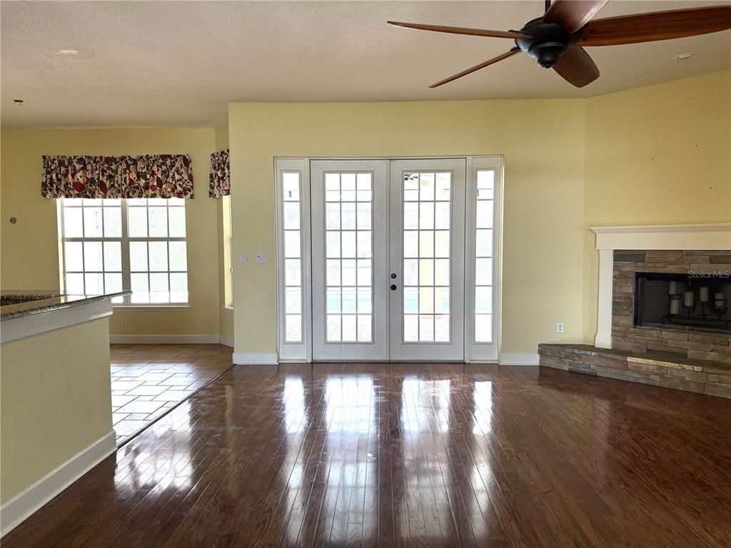 Empty room, Fireplace, Interior, Recessed Lighting, Wood Texture Flooring