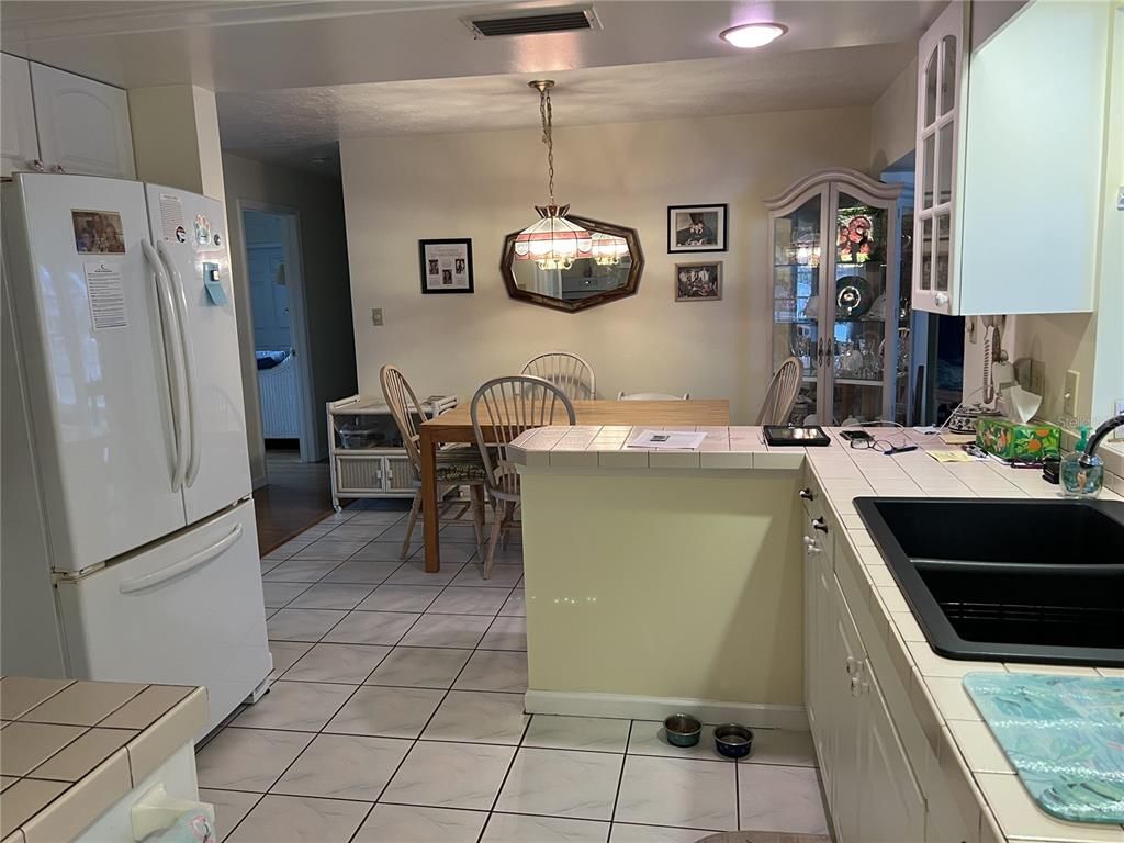 Dining room, Interior, Kitchen, Pendant Lights, Recessed Lighting, Tile Countertops