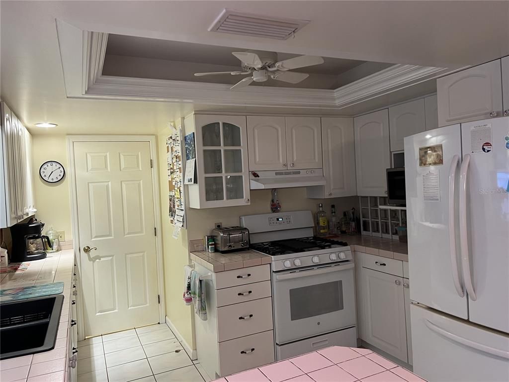 Interior, Kitchen, Recessed Lighting, Tile Countertops