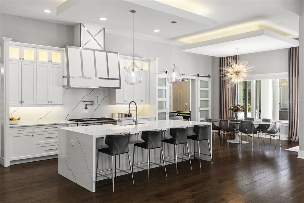 Dining room, Interior, Kitchen, Marble Walls, Pendant Lights, Recessed Lighting, Wood Texture Flooring