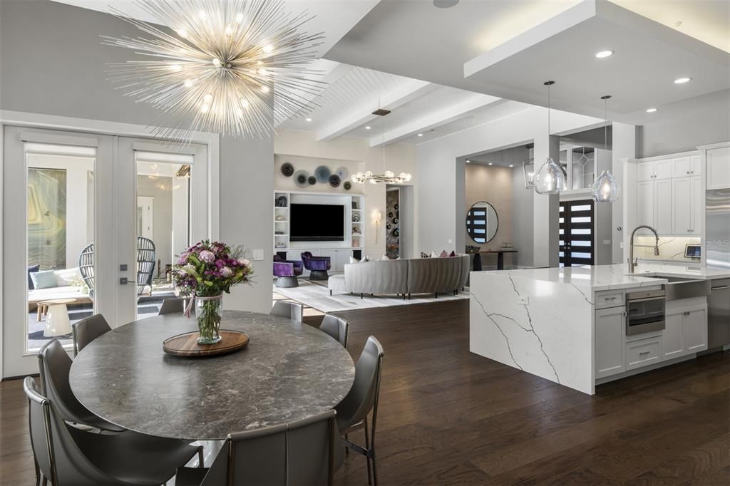 Dining room, Interior, Kitchen, Living room, Pendant Lights, Recessed Lighting, Stainless Steel Appliances, Wood Texture Flooring