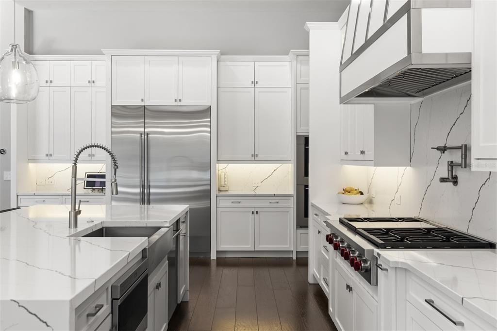 Interior, Kitchen, Marble Walls, Pendant Lights, Stainless Steel Appliances, Wood Texture Flooring
