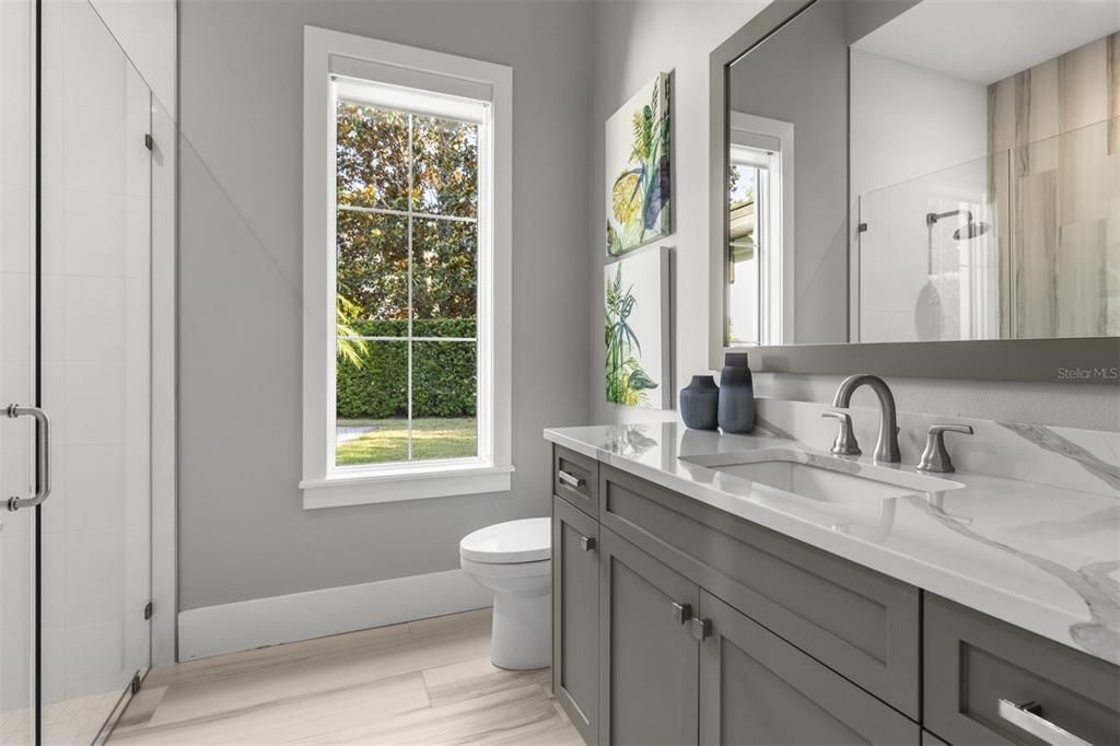 Bathroom, Dual Sink Vanities, Glass Shower, Interior, Wood Texture Flooring