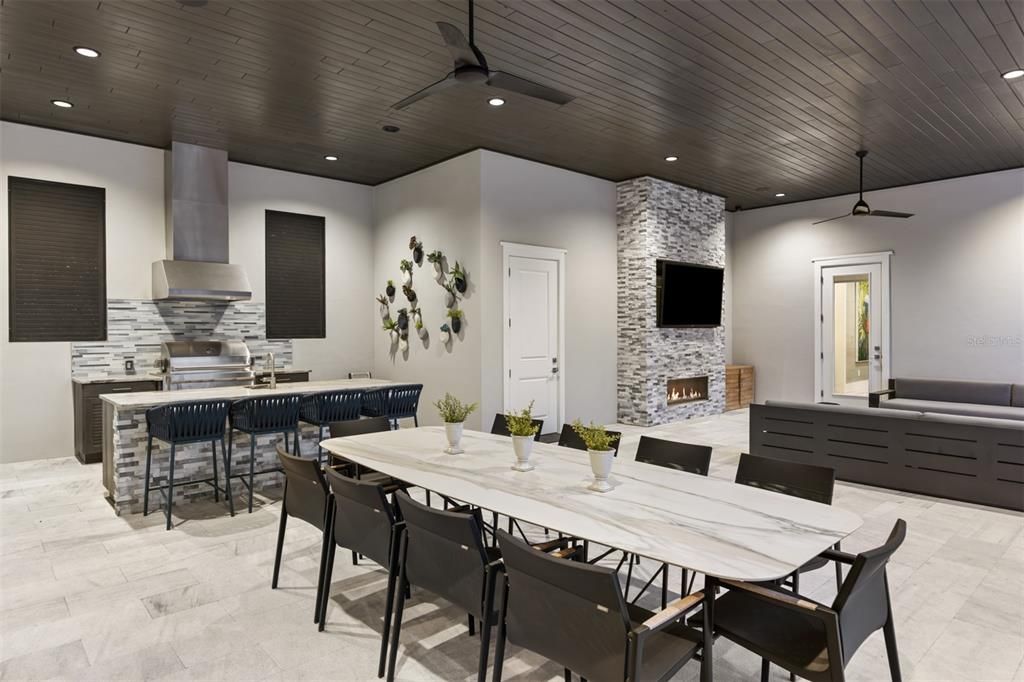 Dining room, Fireplace, Interior, Kitchen, Recessed Lighting, Stone Walls, Wooden Ceilings