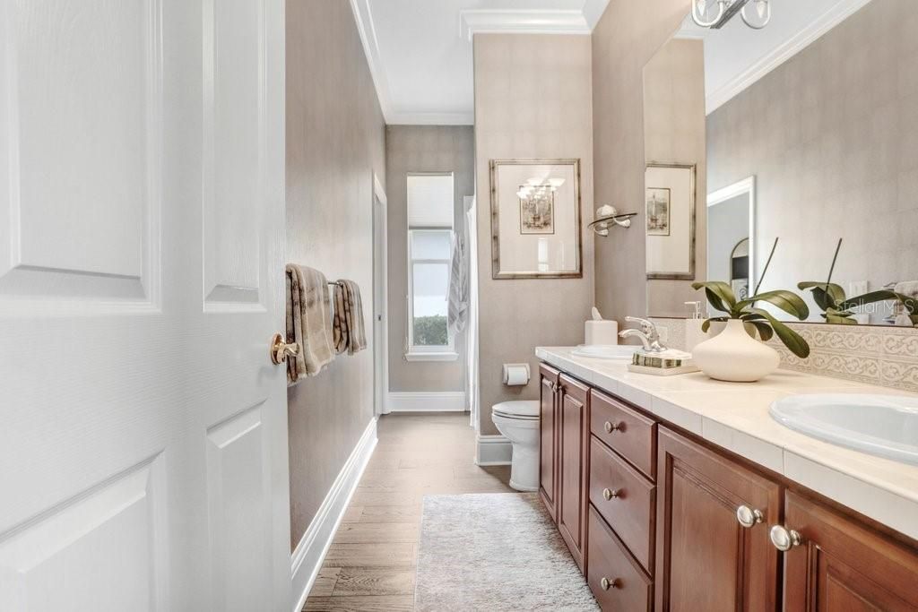 Bathroom, Dual Sink Vanities, Interior, Tile Countertops, Wood Texture Flooring