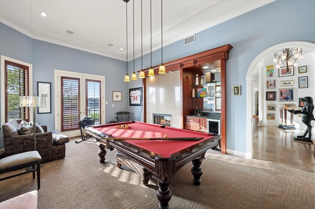 Billiard Table, Fireplace, Game Room, Interior, Pendant Lights, Recessed Lighting, Wood Texture Flooring