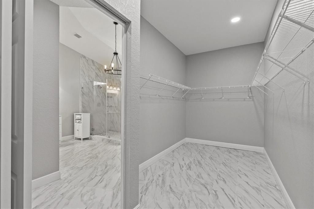 Bathroom, Glass Shower, Interior, Marble, Marble Walls, Pendant Lights, Recessed Lighting, Walk-in Closets