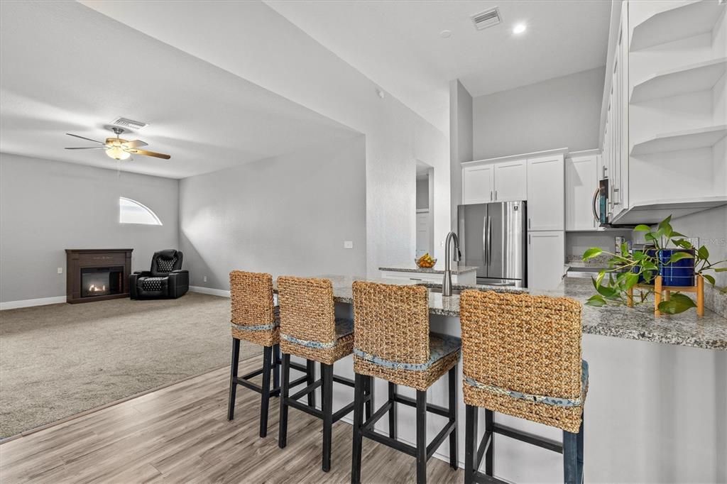 Fireplace, Interior, Kitchen, Recessed Lighting, Wood Texture Flooring