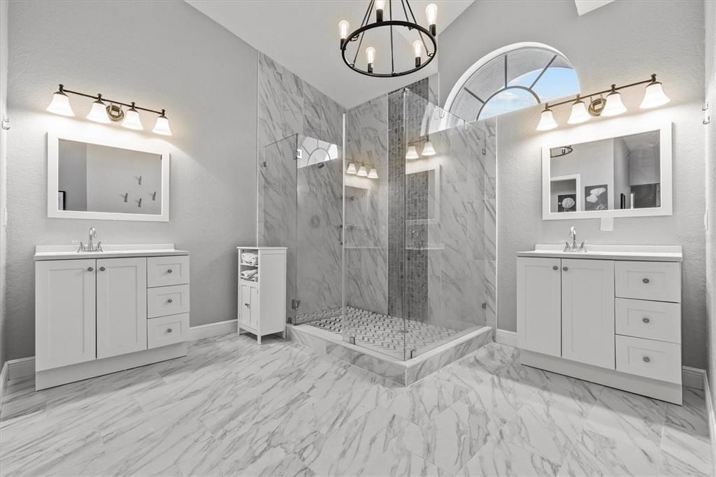 Bathroom, Dual Sink Vanities, Glass Shower, Interior, Marble, Marble Walls, Pendant Lights