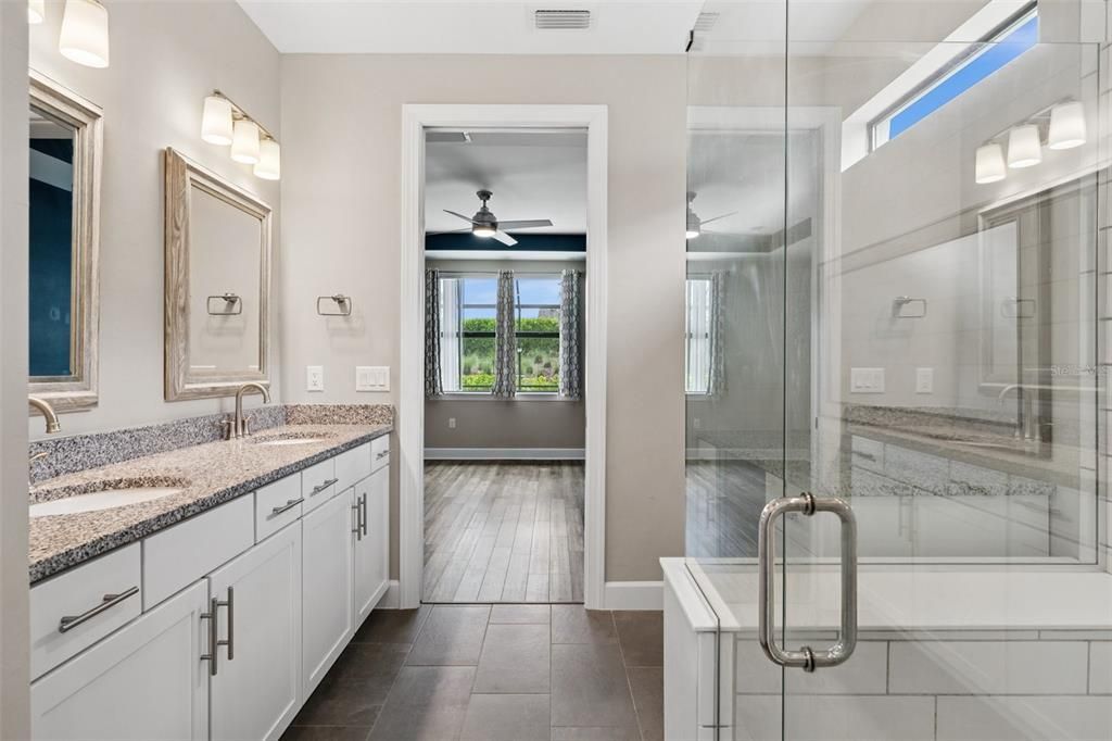 Bathroom, Dual Sink Vanities, Glass Shower, Interior, Wood Texture Flooring