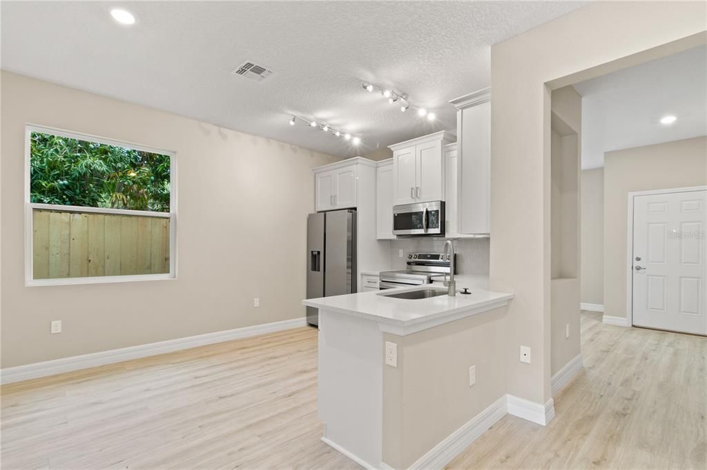 Interior, Kitchen, Recessed Lighting, Stainless Steel Appliances, Wood Texture Flooring