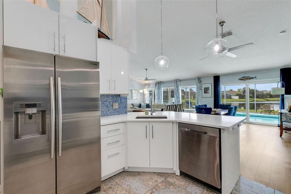 Dining room, Interior, Kitchen, Pendant Lights, Stainless Steel Appliances, Wood Texture Flooring