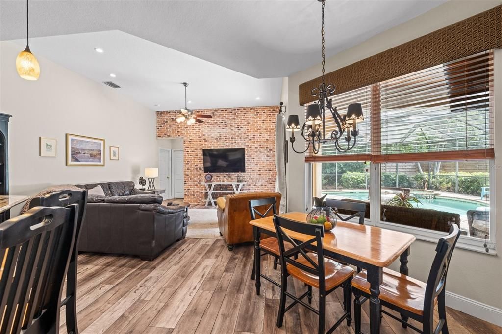 Dining room, Interior, Living room, Pendant Lights, Recessed Lighting, Stone Walls, Wood Texture Flooring