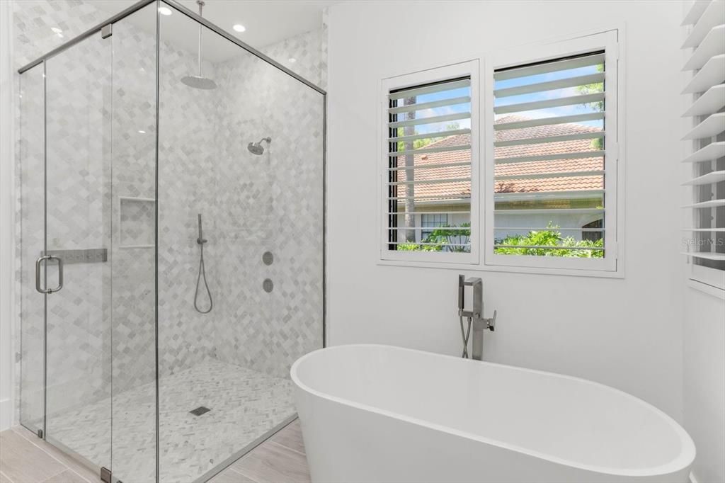 Bathroom, Free Standing Baths, Glass Shower, Interior, Marble Walls, Recessed Lighting