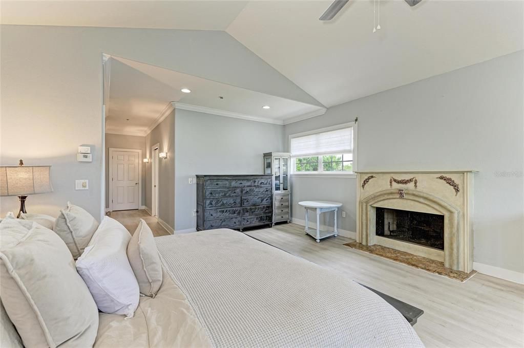 Bedroom, Fireplace, Interior, Recessed Lighting, Wood Texture Flooring