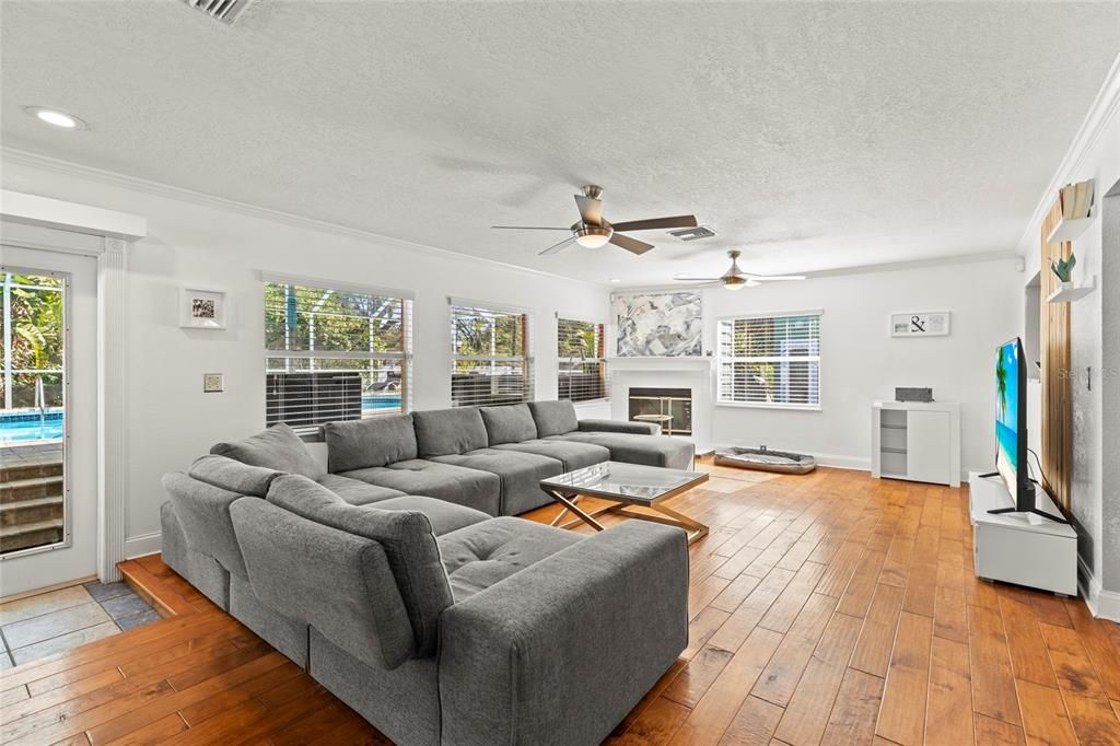 Fireplace, Interior, Living room, Recessed Lighting, Wood Texture Flooring