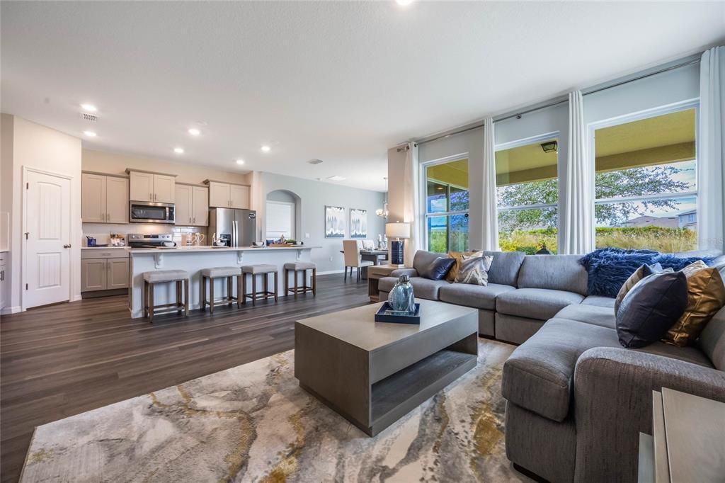 Dining room, Interior, Kitchen, Living room, Recessed Lighting, Stainless Steel Appliances, Wood Texture Flooring