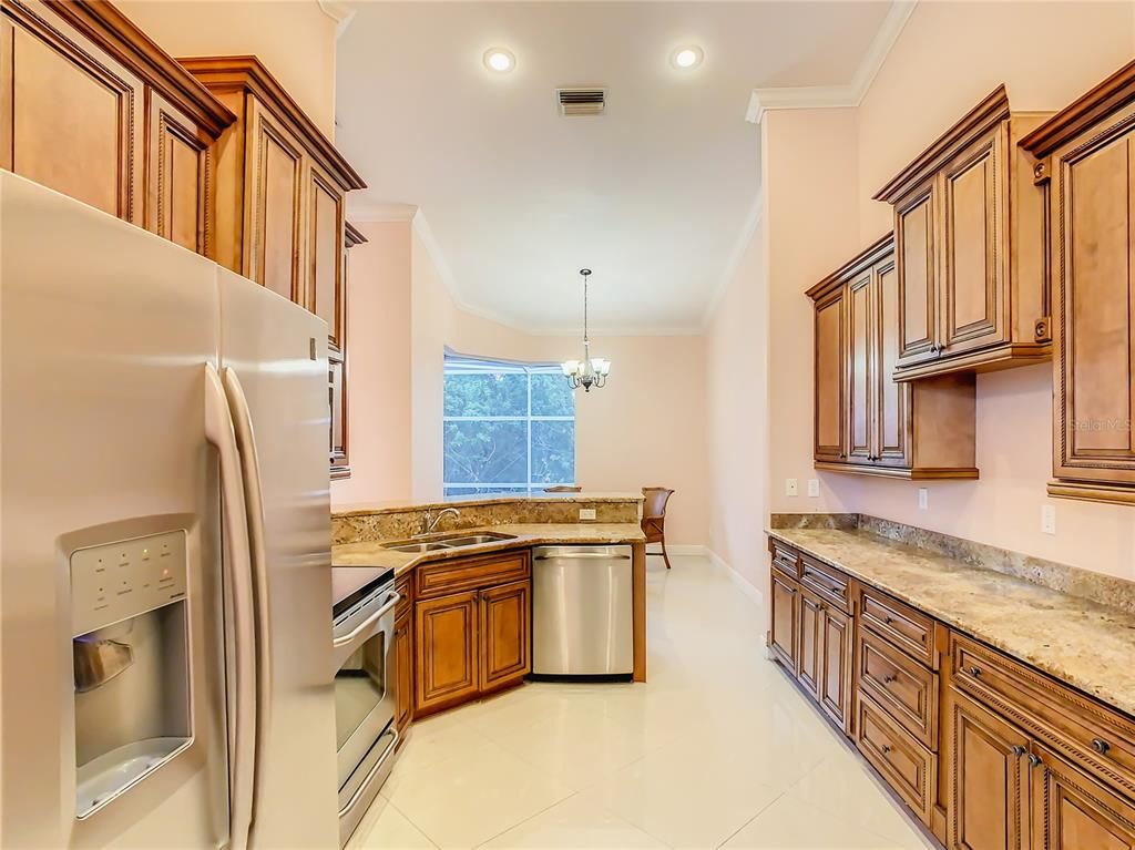Chandelier, Dining room, Interior, Kitchen, Recessed Lighting, Stainless Steel Appliances