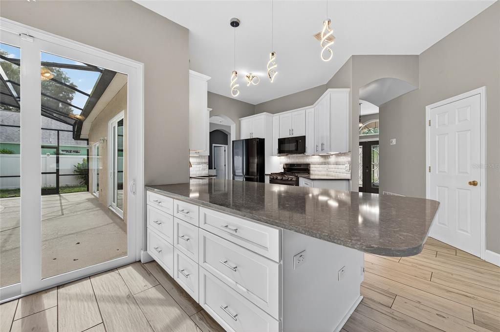 Glass Ceilings, Interior, Kitchen, Pendant Lights, Stainless Steel Appliances, Wood Texture Flooring