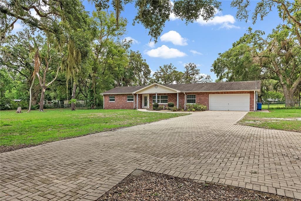 Attached, Backyard, Exterior, Facade, Brick Facade, Ranch
