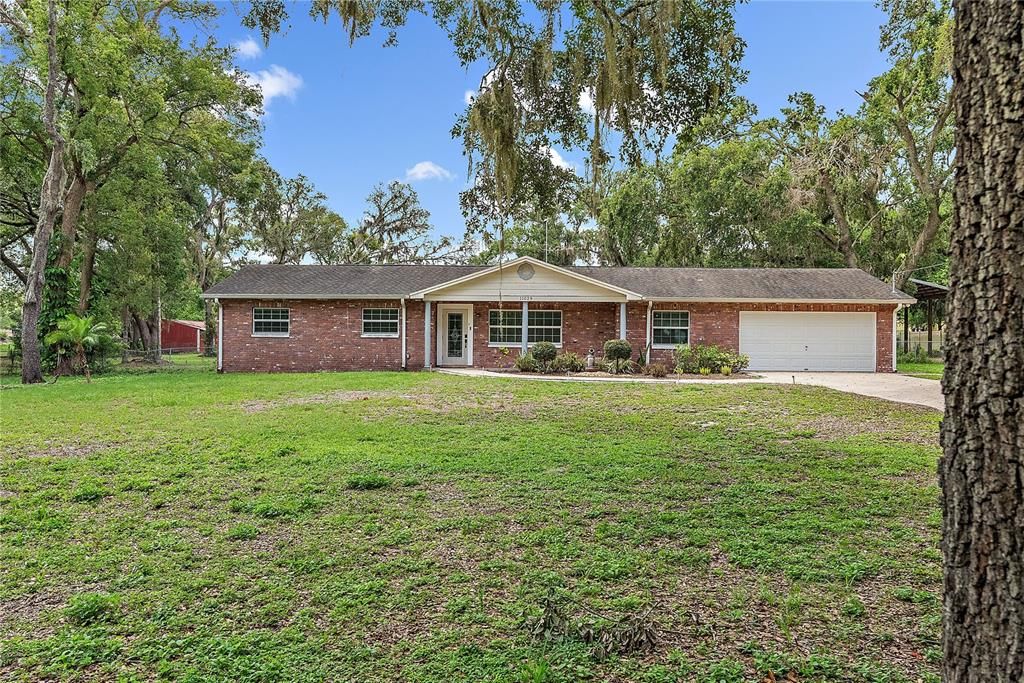 Attached, Backyard, Exterior, Facade, Brick Facade, Ranch