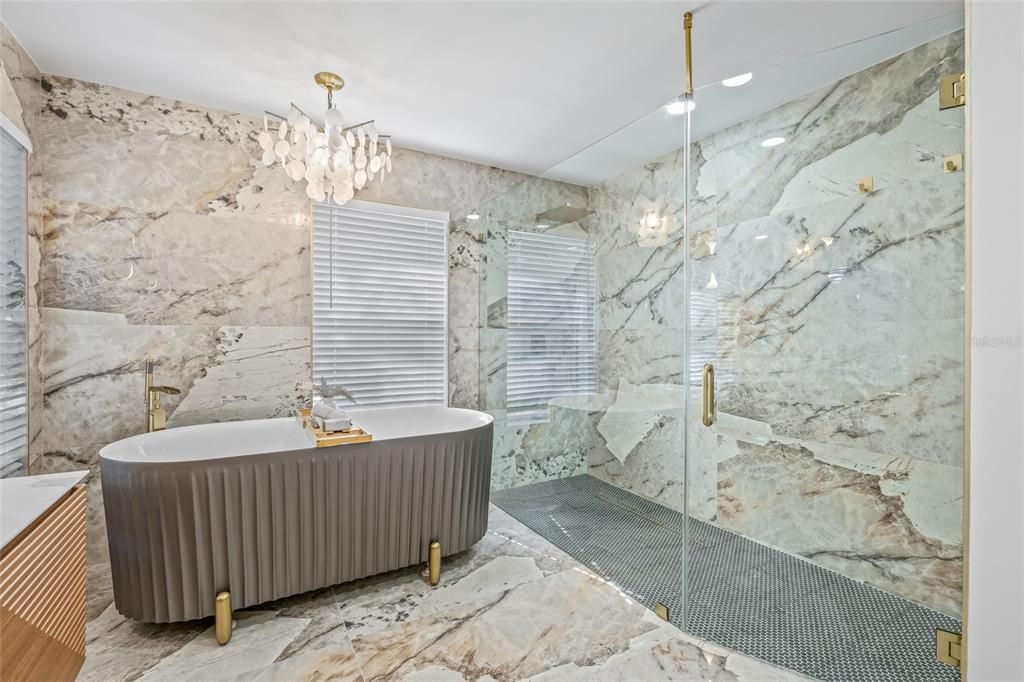 Bathroom, Chandelier, Free Standing Baths, Glass Shower, Interior, Marble, Marble Walls, Recessed Lighting