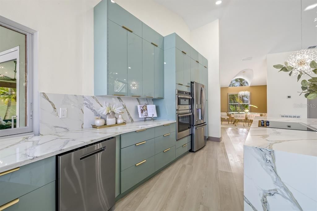Dining room, Interior, Kitchen, Recessed Lighting, Stainless Steel Appliances, Wood Texture Flooring