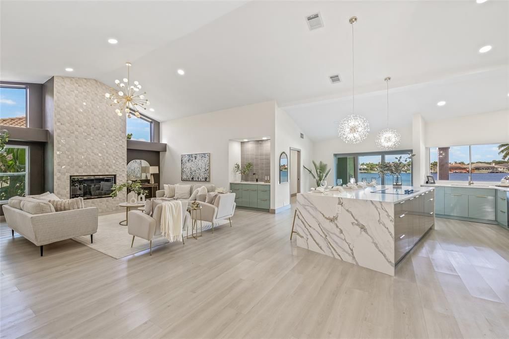 Fireplace, Interior, Kitchen, Living room, Pendant Lights, Recessed Lighting, Water, Wood Texture Flooring