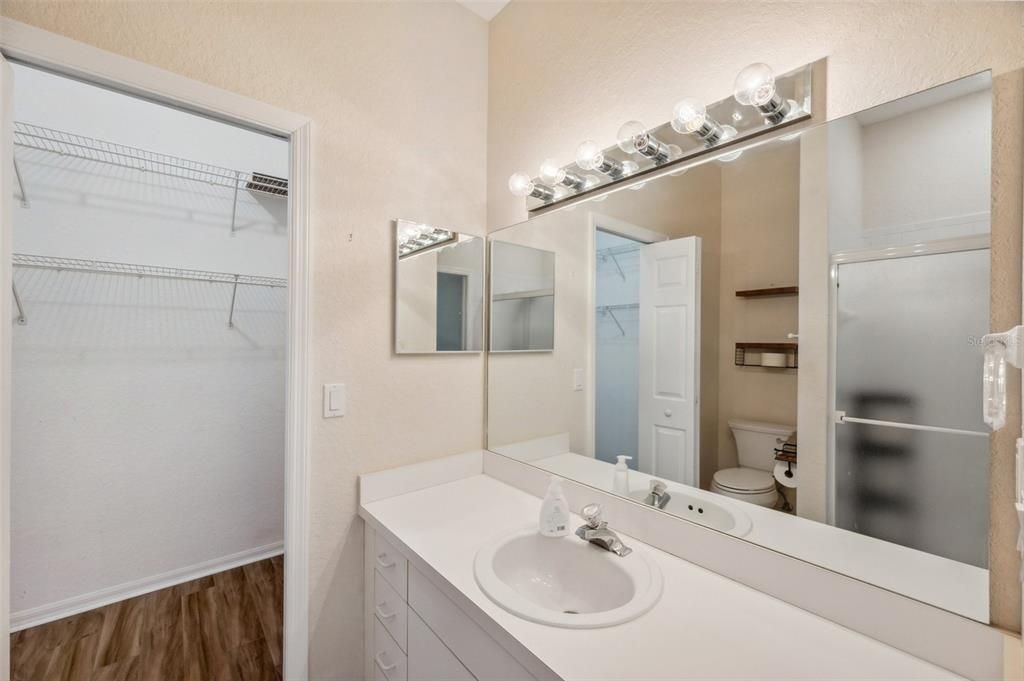 Bathroom, Dual Sink Vanities, Glass Shower, Interior, Walk-in Closets, Wood Texture Flooring