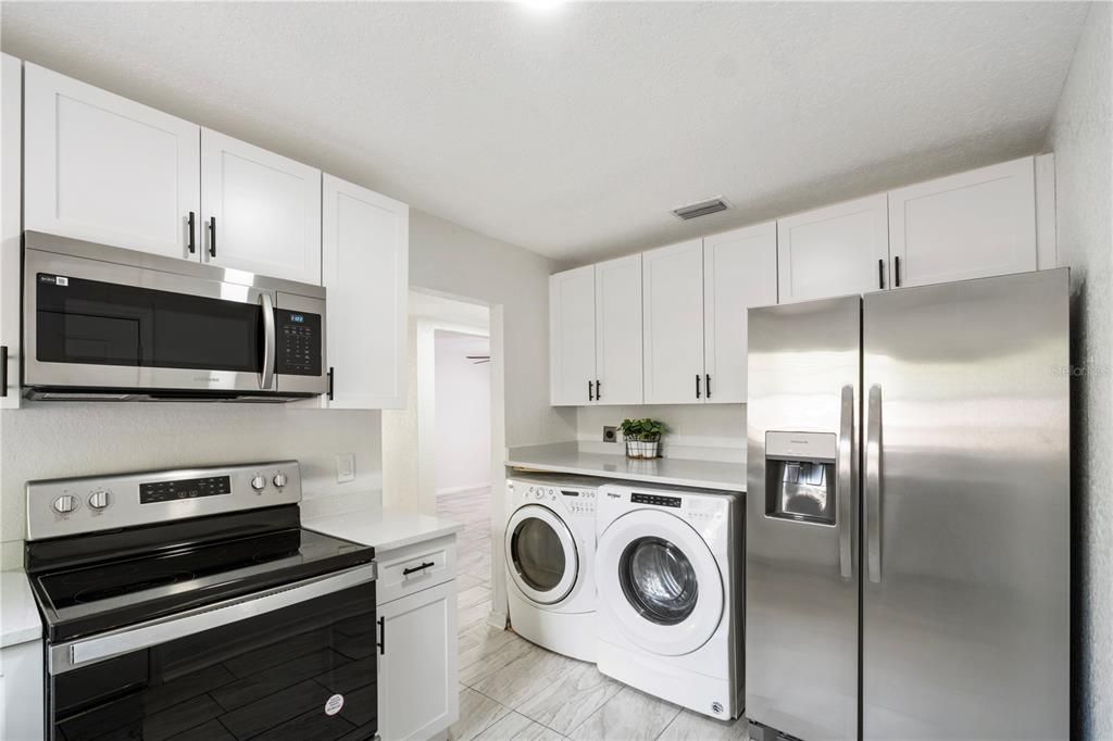 Interior, Kitchen, Stainless Steel Appliances, Washer, Wood Texture Flooring