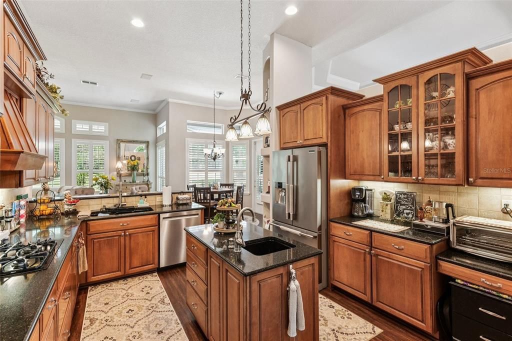 Chandelier, Interior, Kitchen, Pendant Lights, Recessed Lighting, Stainless Steel Appliances, Wood Texture Flooring