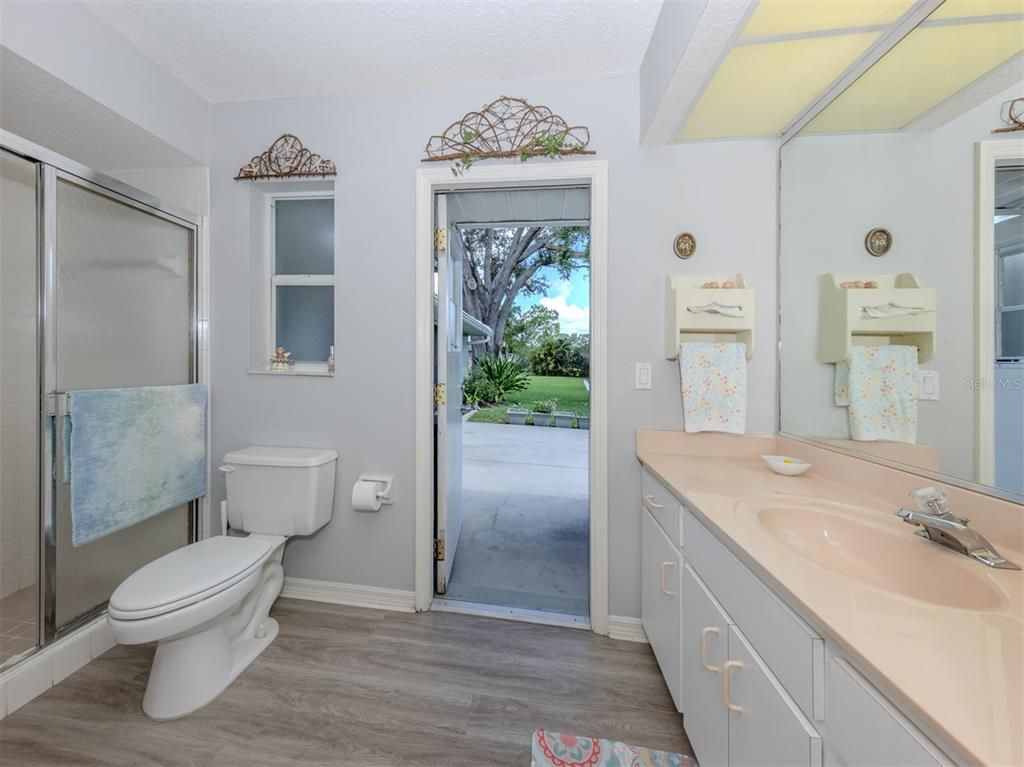 Bathroom, Dual Sink Vanities, Glass Shower, Interior, Wood Texture Flooring