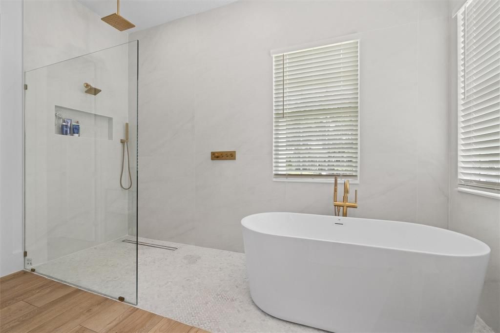 Bathroom, Free Standing Baths, Glass Shower, Interior, Marble Walls, Wood Texture Flooring