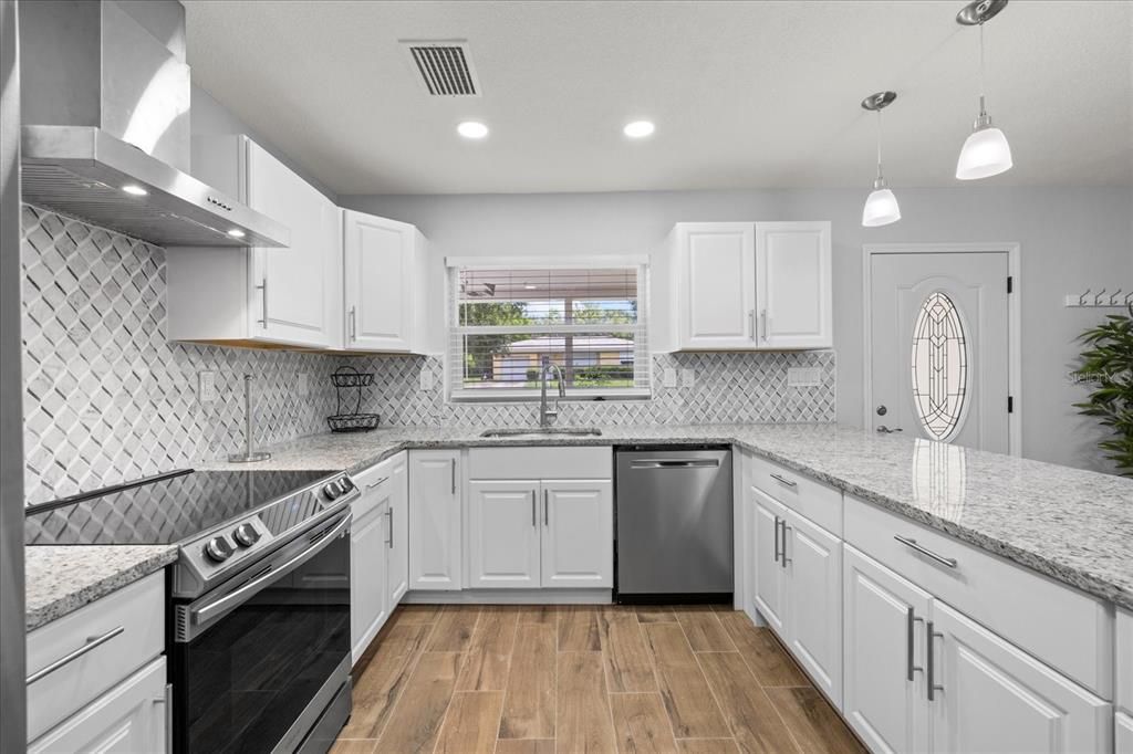 Interior, Kitchen, Pendant Lights, Recessed Lighting, Stainless Steel Appliances, Wood Texture Flooring