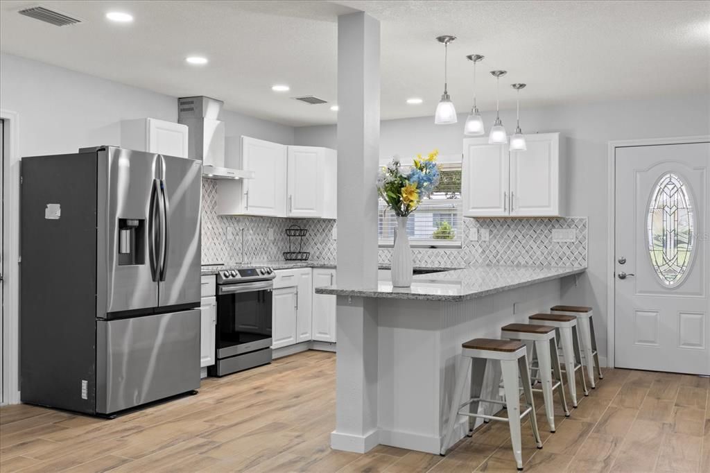 Interior, Kitchen, Pendant Lights, Recessed Lighting, Stainless Steel Appliances, Wood Texture Flooring