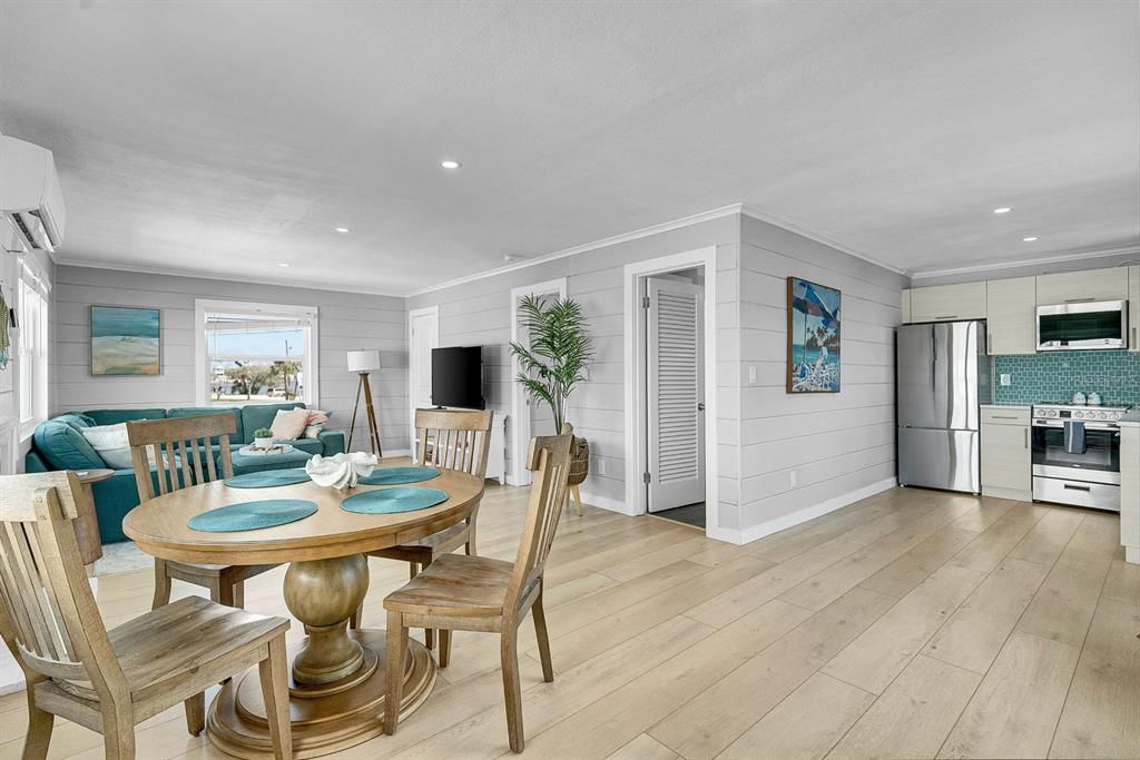 Dining room, Interior, Kitchen, Recessed Lighting, Stainless Steel Appliances, Wood Texture Flooring