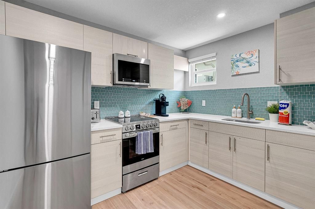 Interior, Kitchen, Recessed Lighting, Stainless Steel Appliances, Wood Texture Flooring