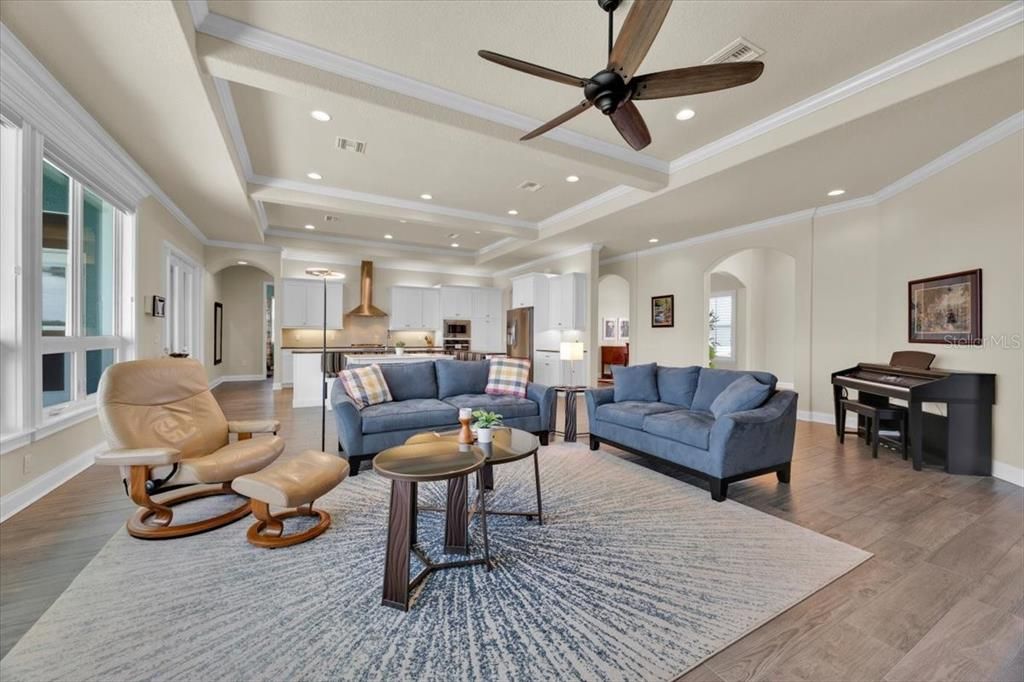 Interior, Kitchen, Living room, Piano, Recessed Lighting, Stainless Steel Appliances, Wood Texture Flooring