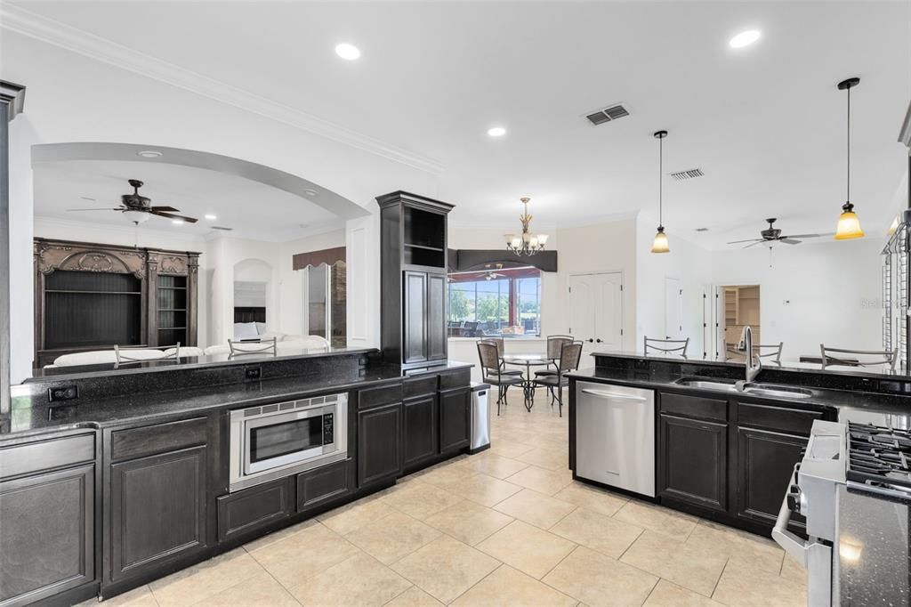 Chandelier, Dining room, Interior, Kitchen, Pendant Lights, Recessed Lighting, Stainless Steel Appliances