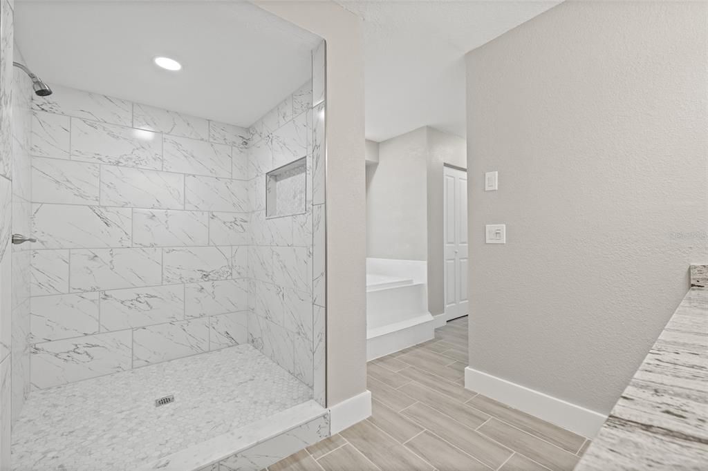 Bathroom, Interior, Marble Walls, Recessed Lighting, Wood Texture Flooring