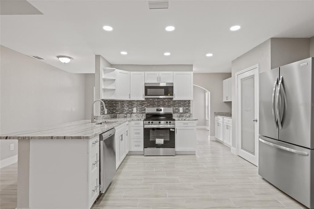 Interior, Kitchen, Recessed Lighting, Stainless Steel Appliances, Wood Texture Flooring