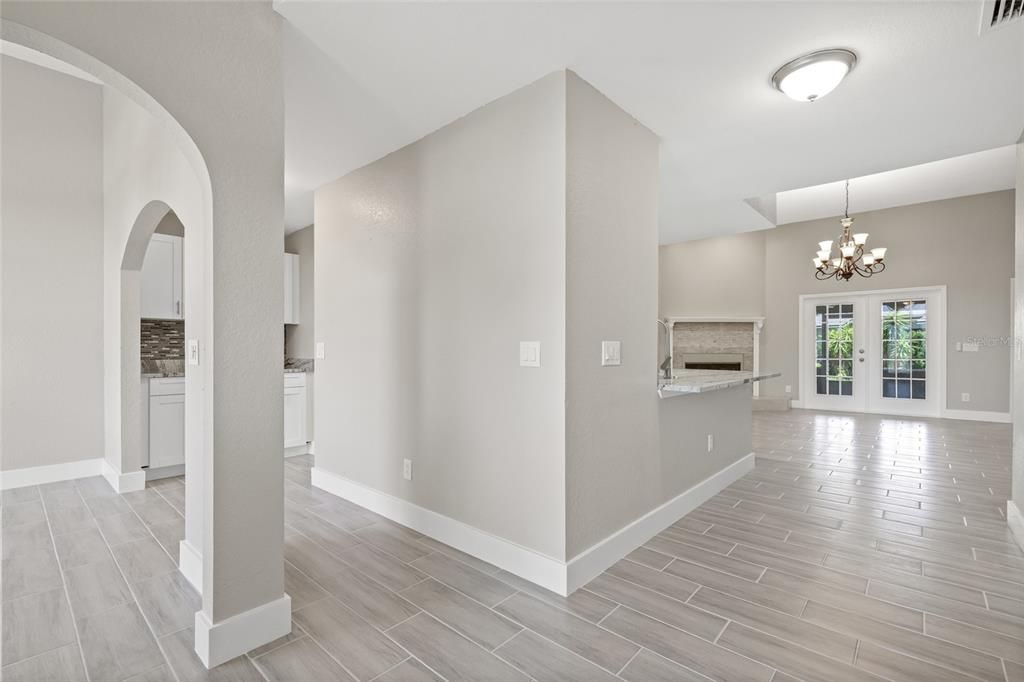 Chandelier, Empty room, Fireplace, Interior, Wood Texture Flooring