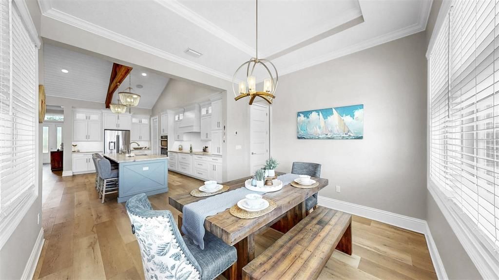 Dining room, Interior, Kitchen, Pendant Lights, Recessed Lighting, Stainless Steel Appliances, Wood Texture Flooring