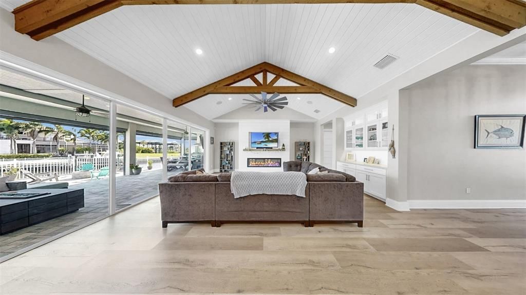 Fireplace, Interior, Living room, Recessed Lighting, Wooden Beams, Wood Texture Flooring
