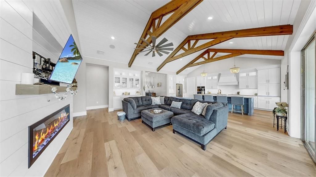 Fireplace, Interior, Kitchen, Living room, Pendant Lights, Recessed Lighting, Wooden Beams, Wood Texture Flooring