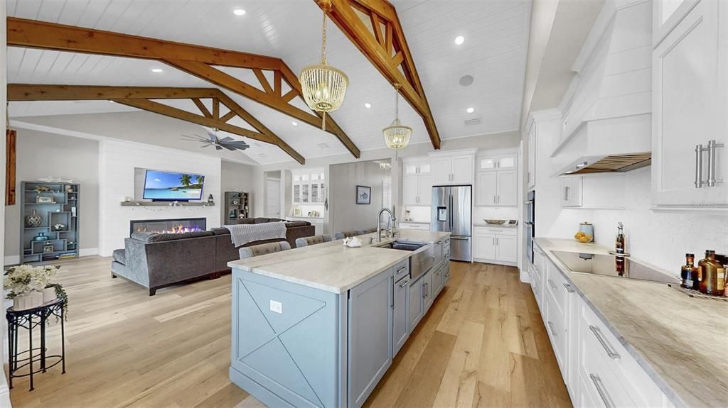Fireplace, Interior, Kitchen, Living room, Pendant Lights, Recessed Lighting, Wooden Beams, Wood Texture Flooring