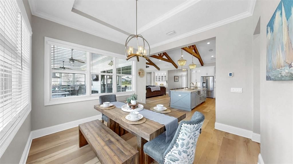 Dining room, Interior, Kitchen, Pendant Lights, Recessed Lighting, Stainless Steel Appliances, Wood Texture Flooring