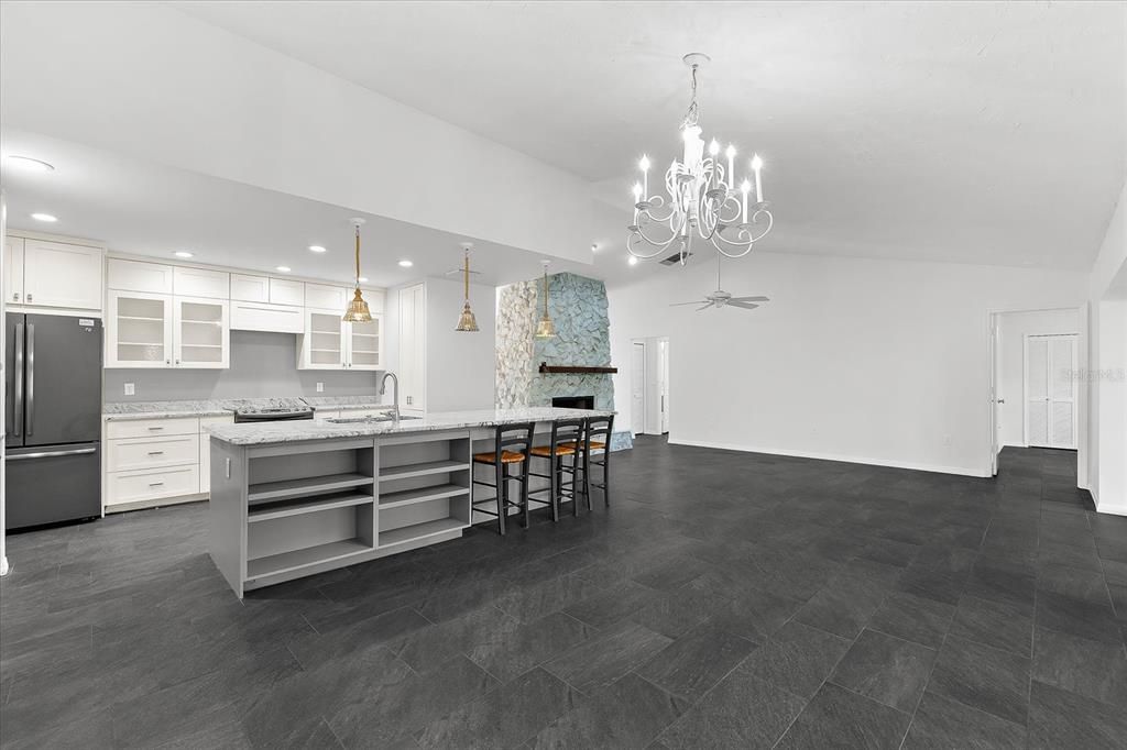 Chandelier, Fireplace, Interior, Kitchen, Pendant Lights, Recessed Lighting, Stainless Steel Appliances