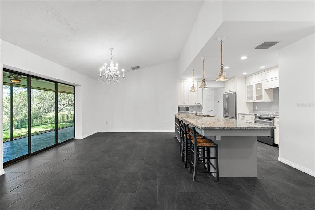 Chandelier, Interior, Kitchen, Pendant Lights, Recessed Lighting, Stainless Steel Appliances, Wood Texture Flooring